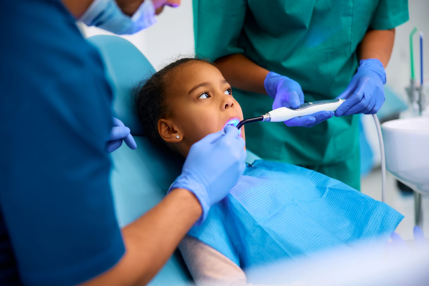 little girl at the dentist